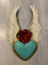 Winged heart with a flower