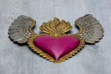 Winged heart a flame with flowers
