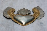 Winged heart a flame with flowers