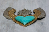 Winged heart a flame with flowers