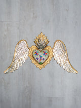Winged heart facing down double flame Tenango