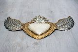 Winged heart above double flame