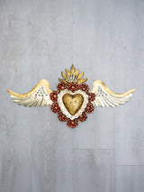 Double flamed winged heart with flowers and candelabra