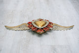 Double flamed winged heart with flowers and candelabra