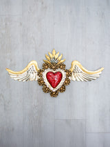 Double flamed winged heart with flowers and candelabra