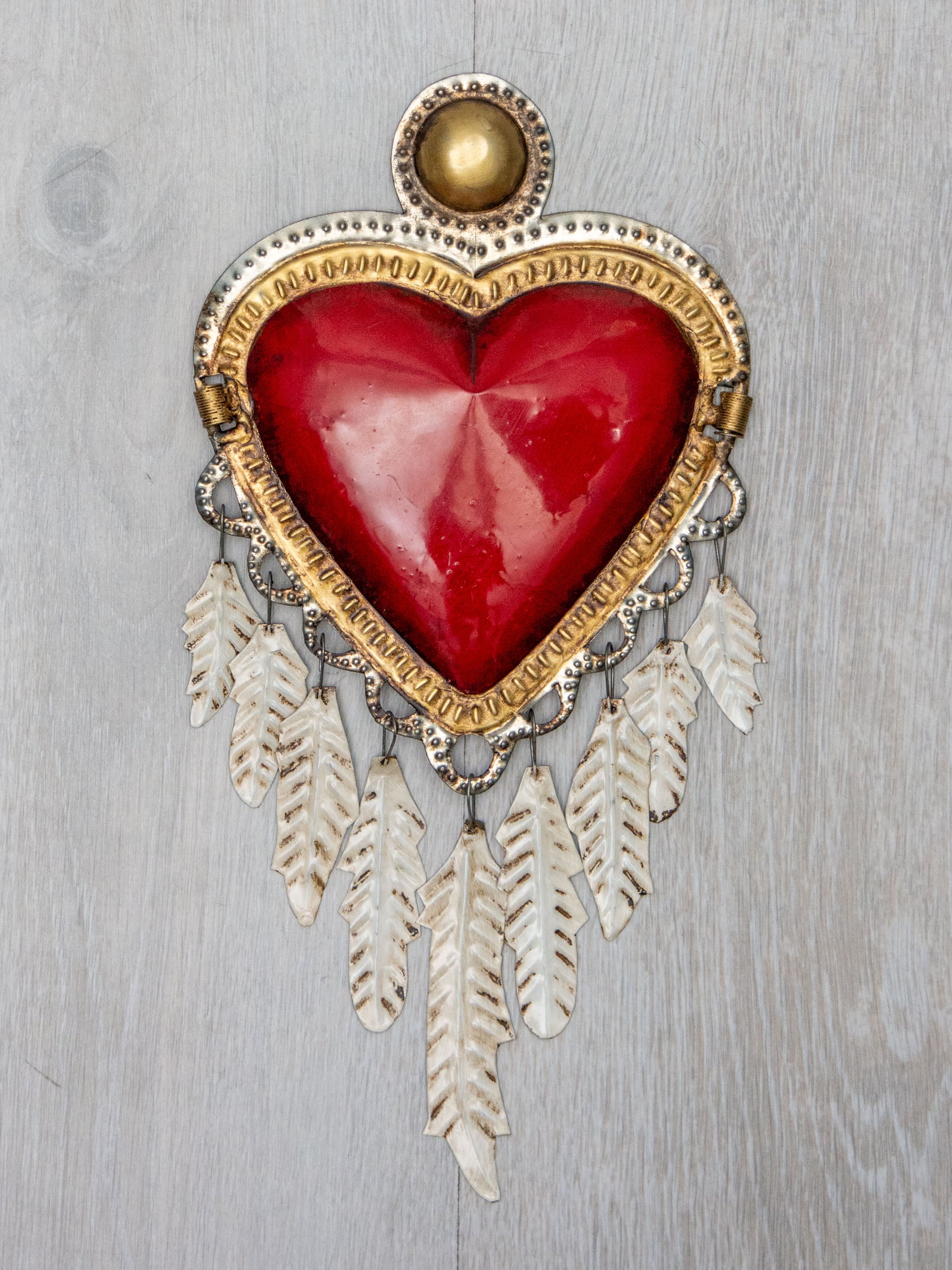 Corazón plumas colgantes