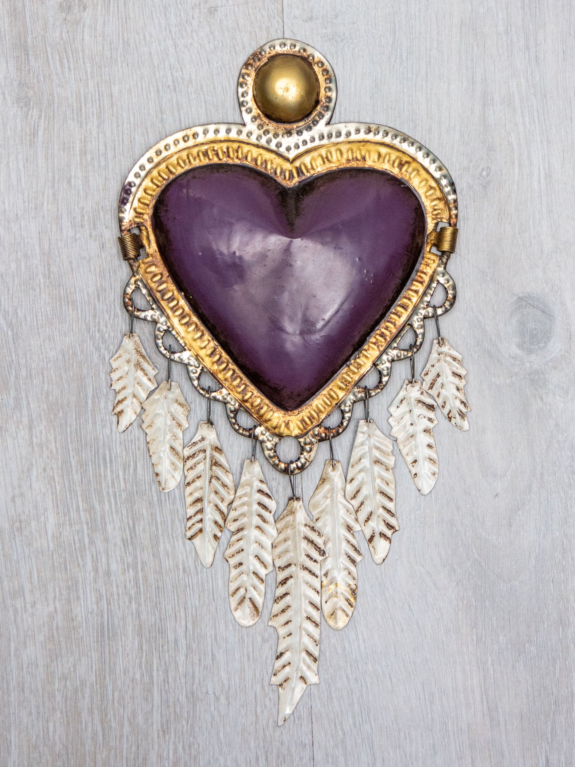 Corazón plumas colgantes