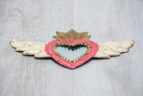 Winged heart with small mirror
