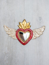 Winged heart with small mirror