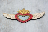 Winged heart with small mirror