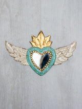 Winged heart with small mirror