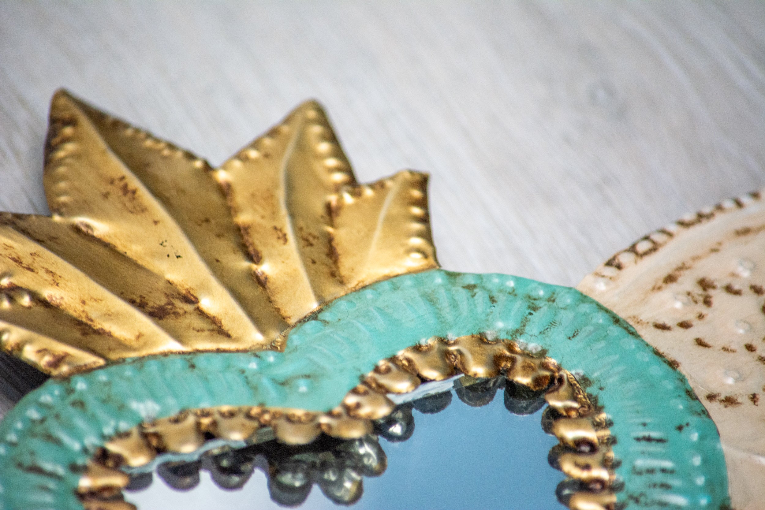 Winged heart with small mirror