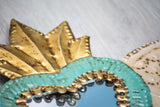 Winged heart with small mirror
