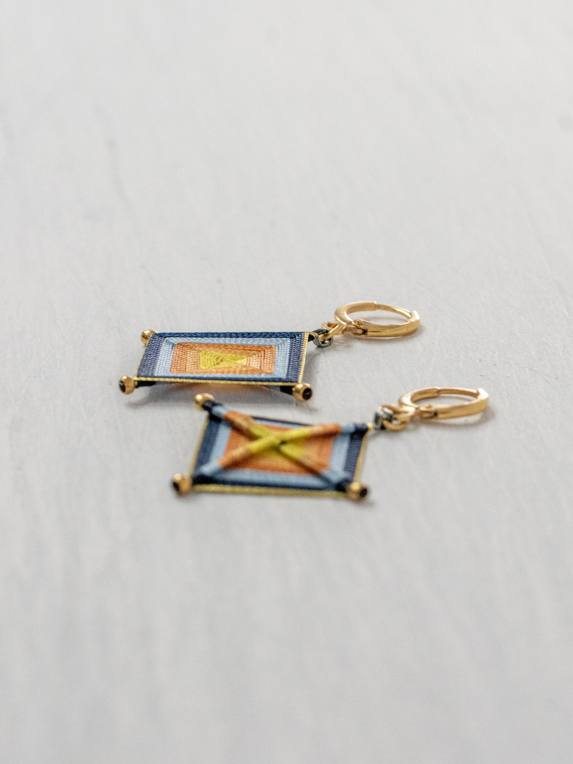 Aretes ojos de dios