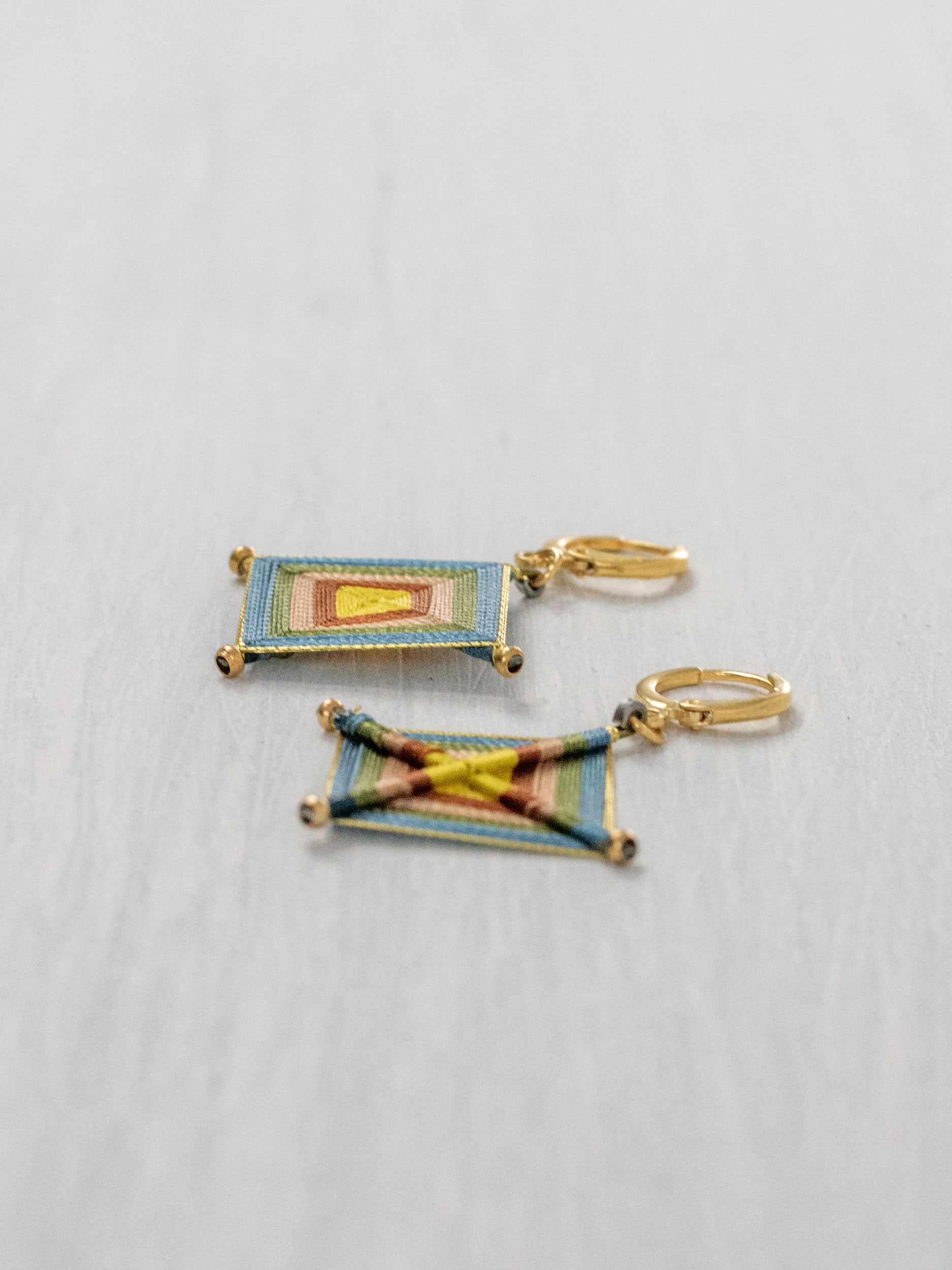 Aretes ojos de dios