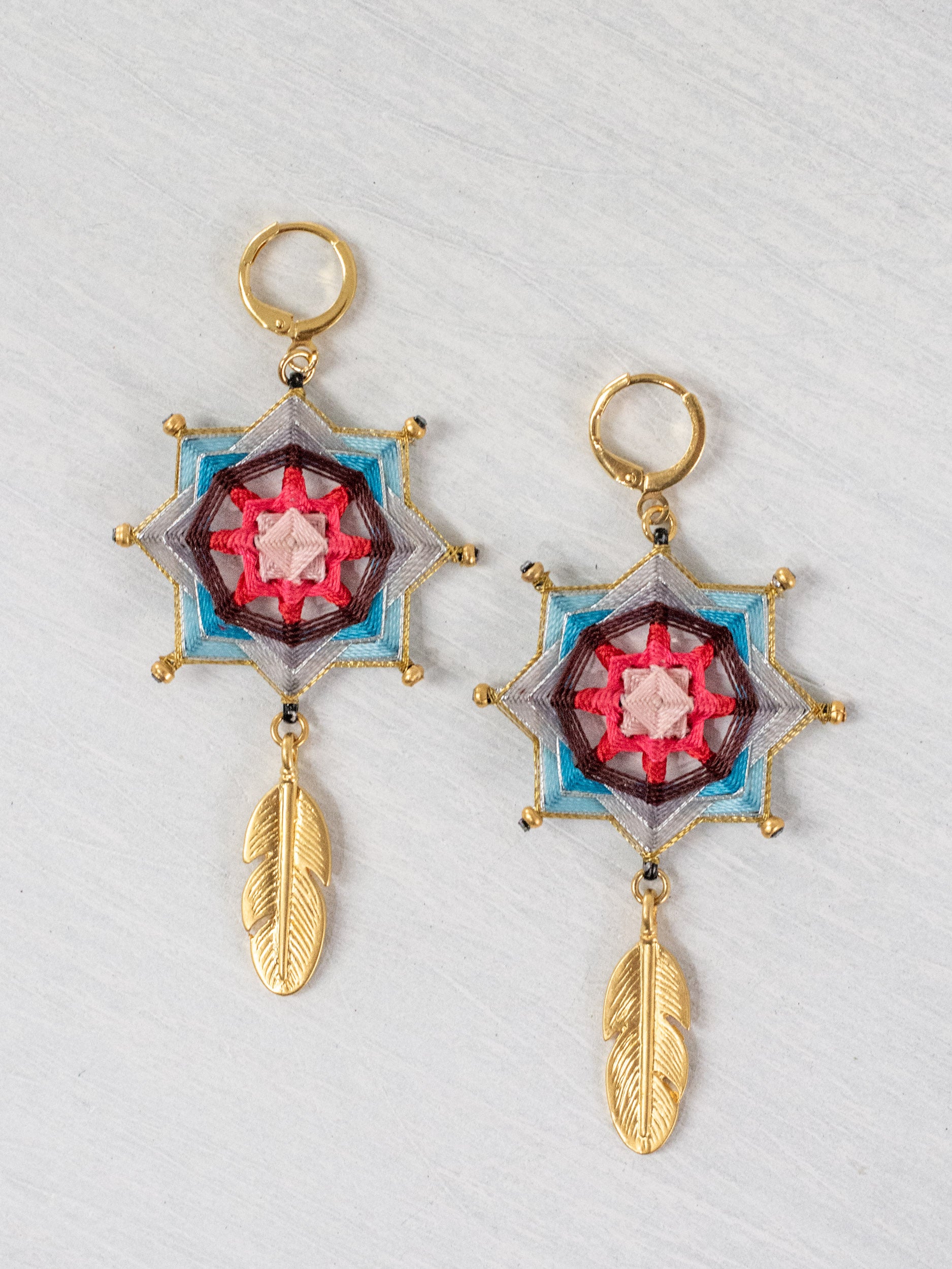Small star mandala earrings with feathers