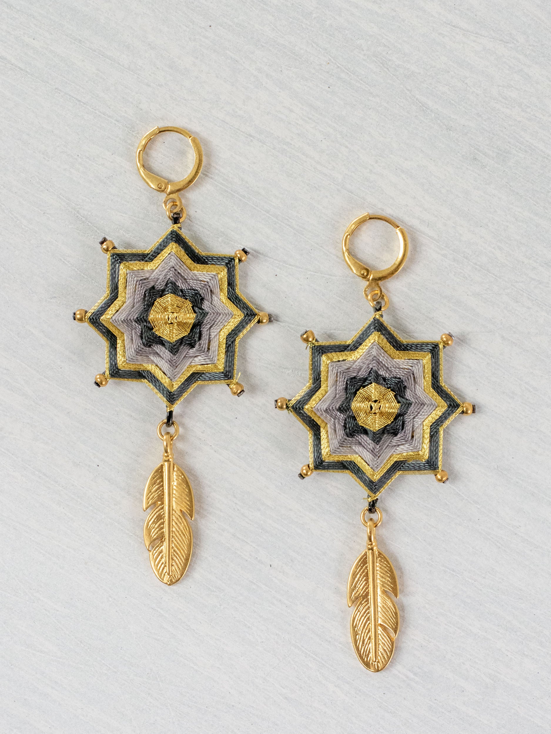 Small star mandala earrings with feathers