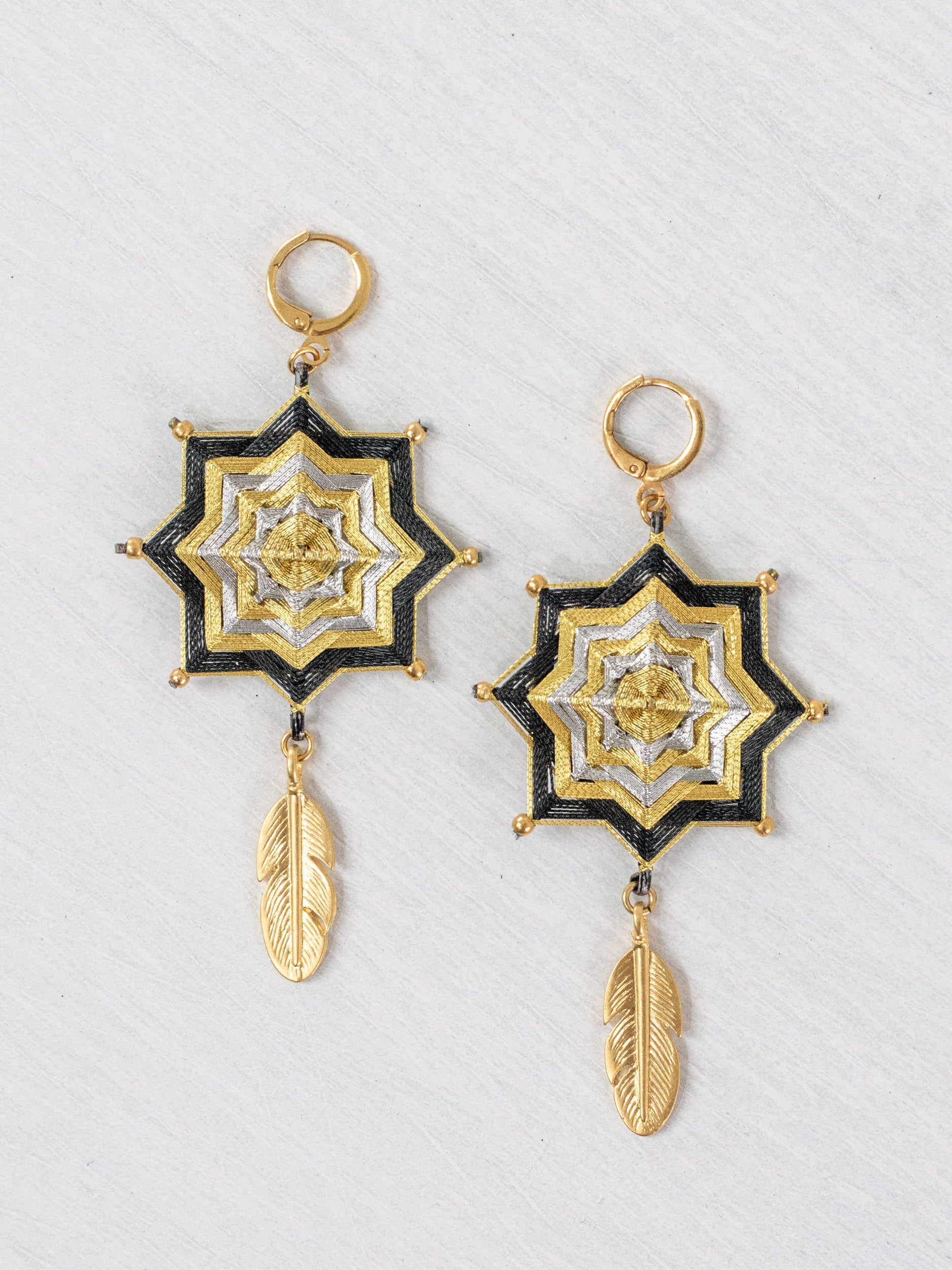 Mandala star earrings with large feathers