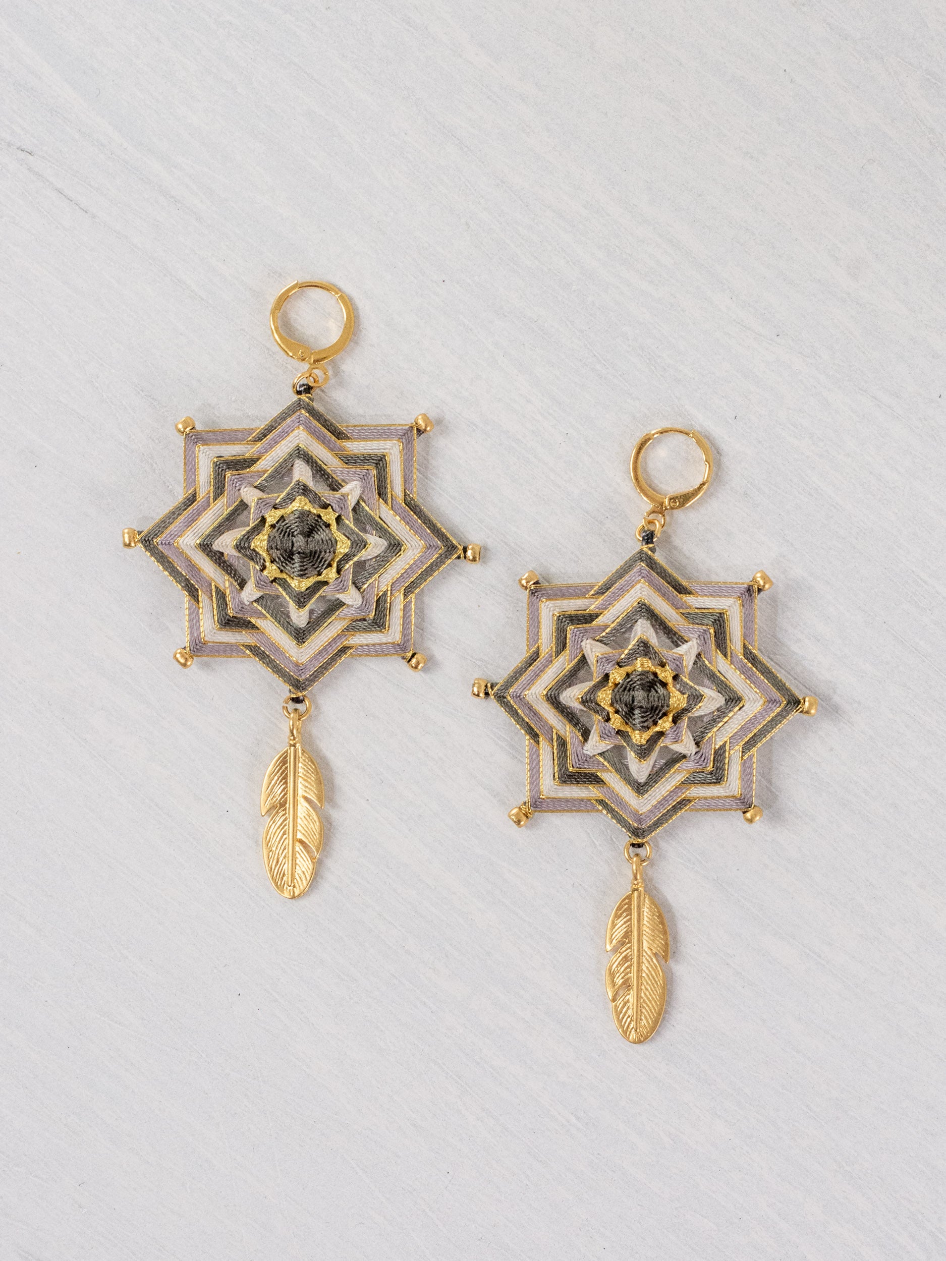 Mandala star earrings with large feathers