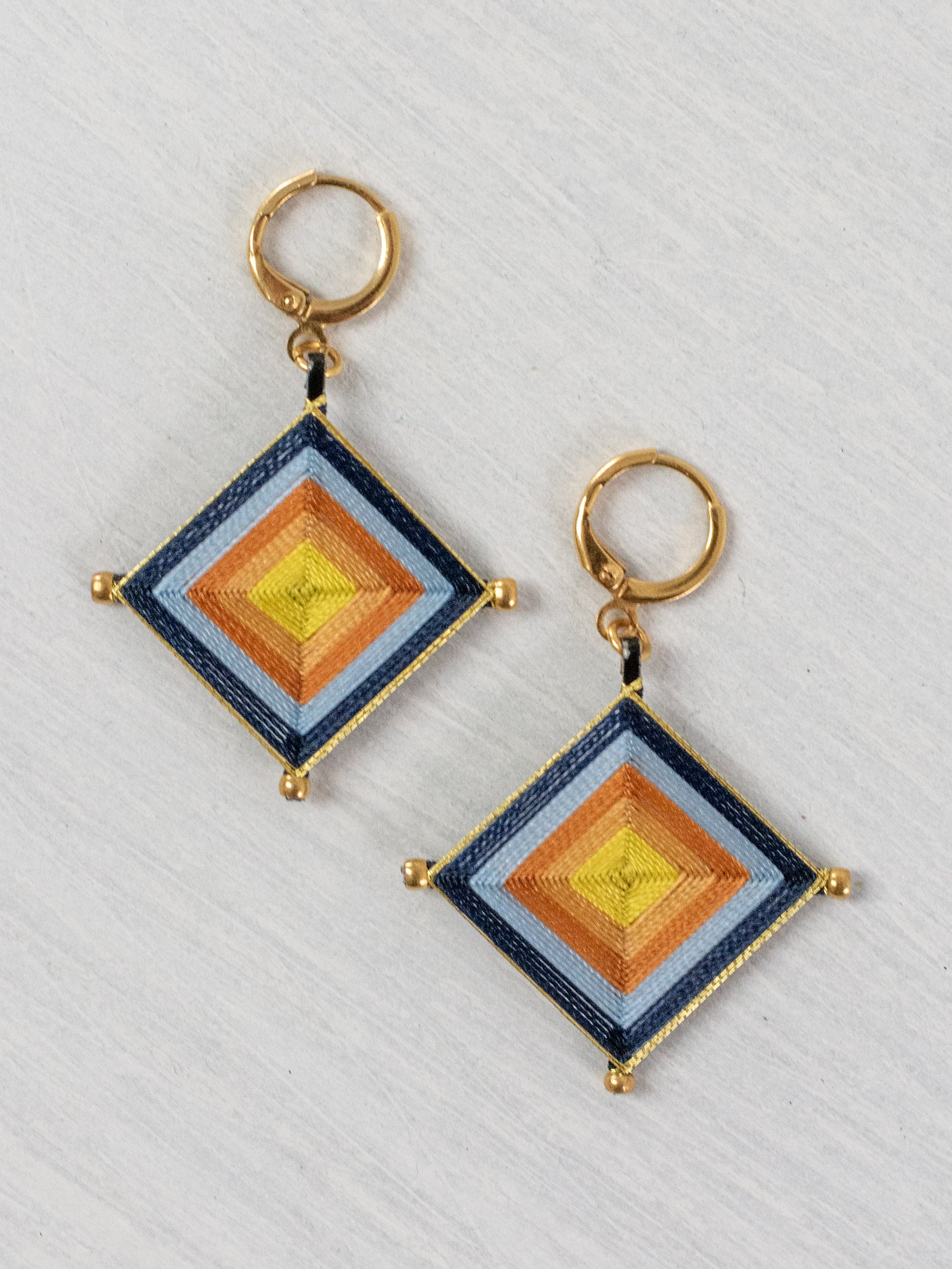 Aretes ojos de dios