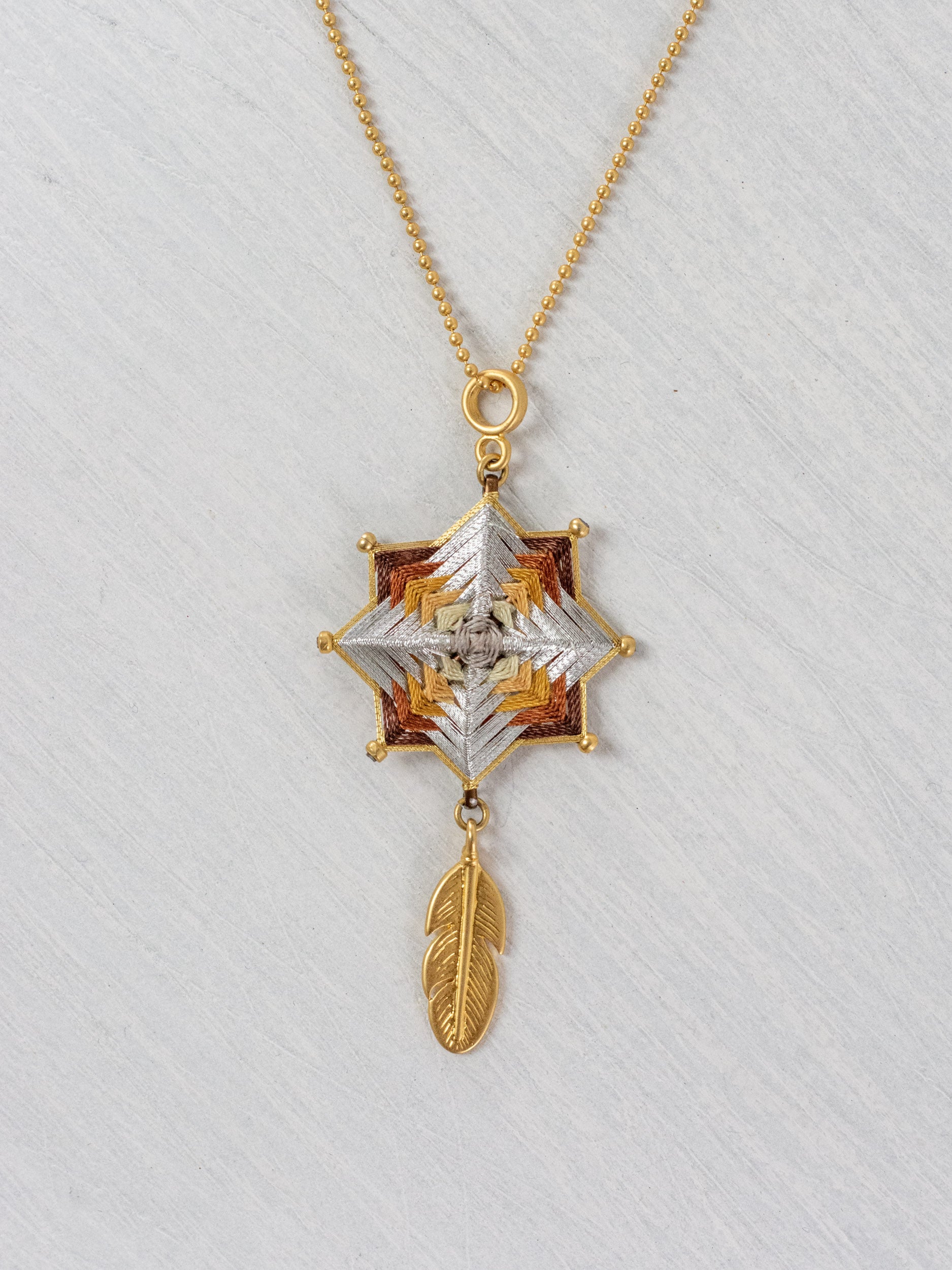 Small mandala star necklace with feather