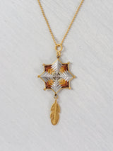 Small mandala star necklace with feather