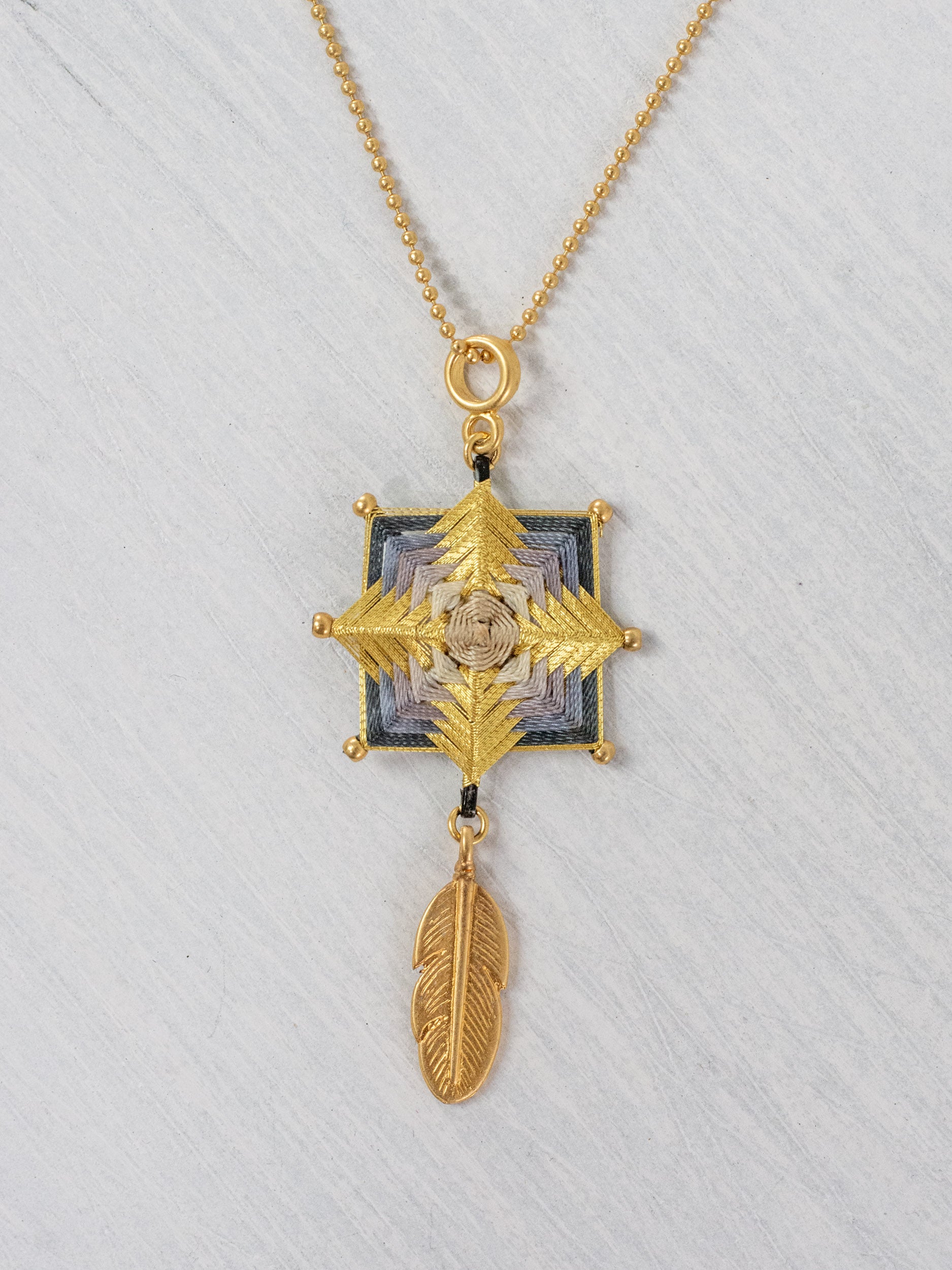Small mandala star necklace with feather