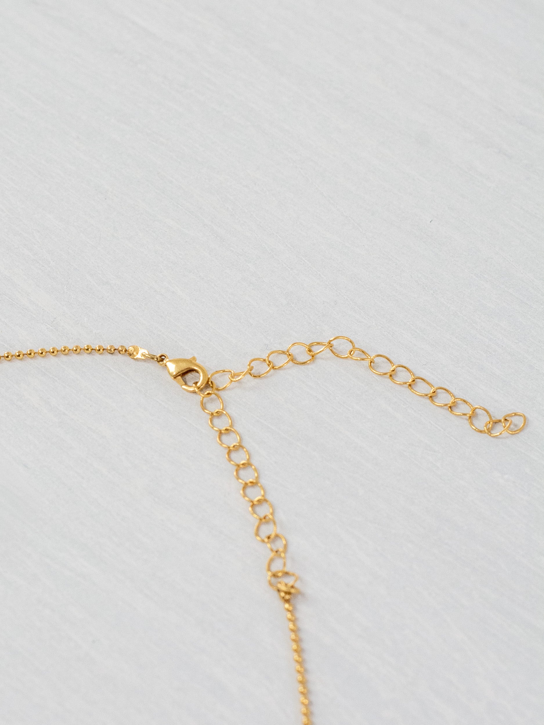 Small mandala star necklace with feather