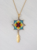 Mandala star necklace with large feather