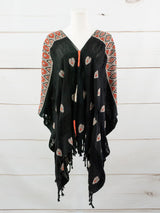 Long poncho with three frayed lines from Chiapas