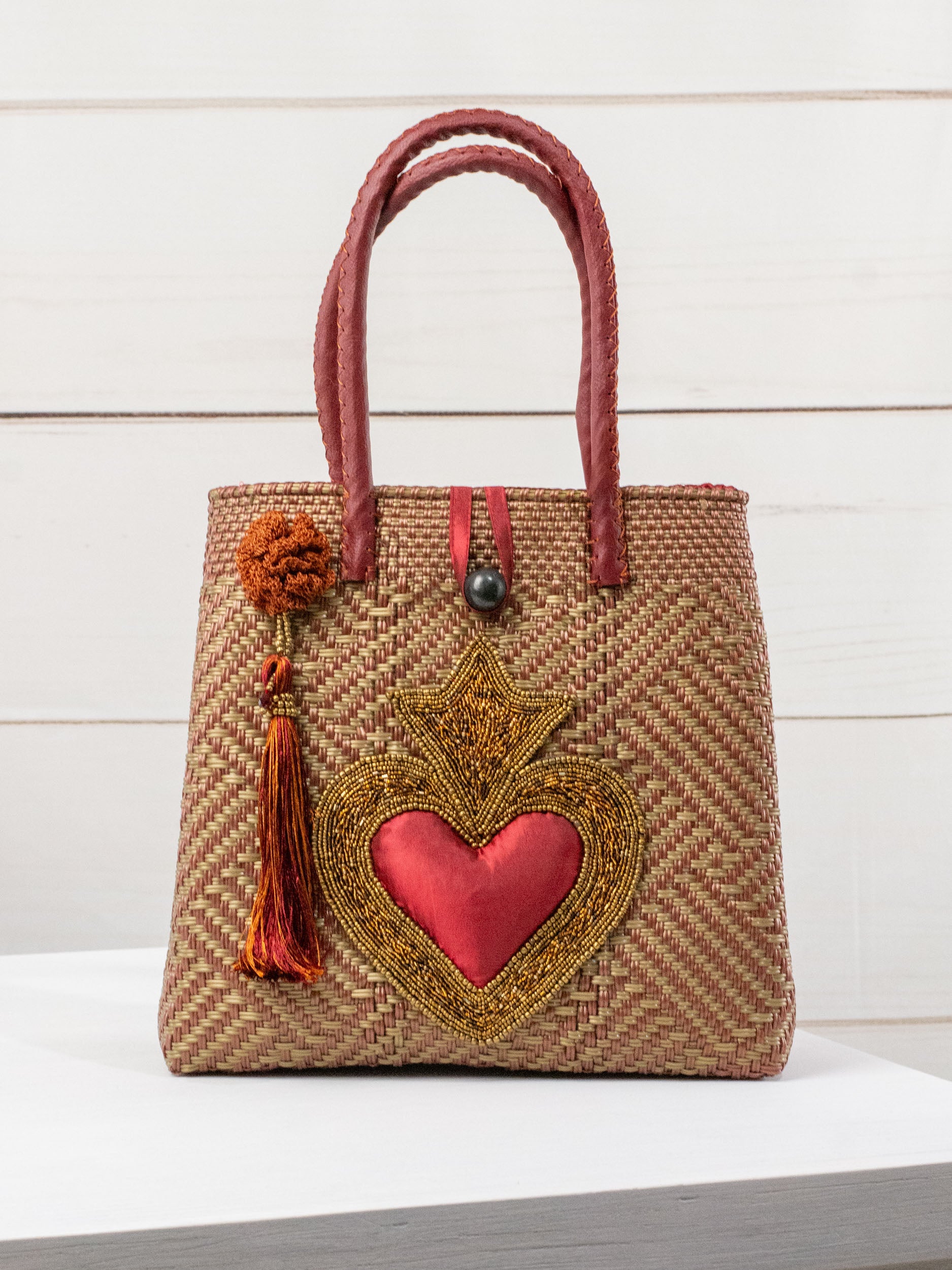 Medium heart milagro artisan bag with flower pompom