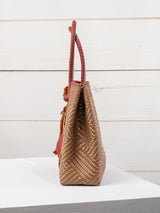Medium heart milagro artisan bag with flower pompom