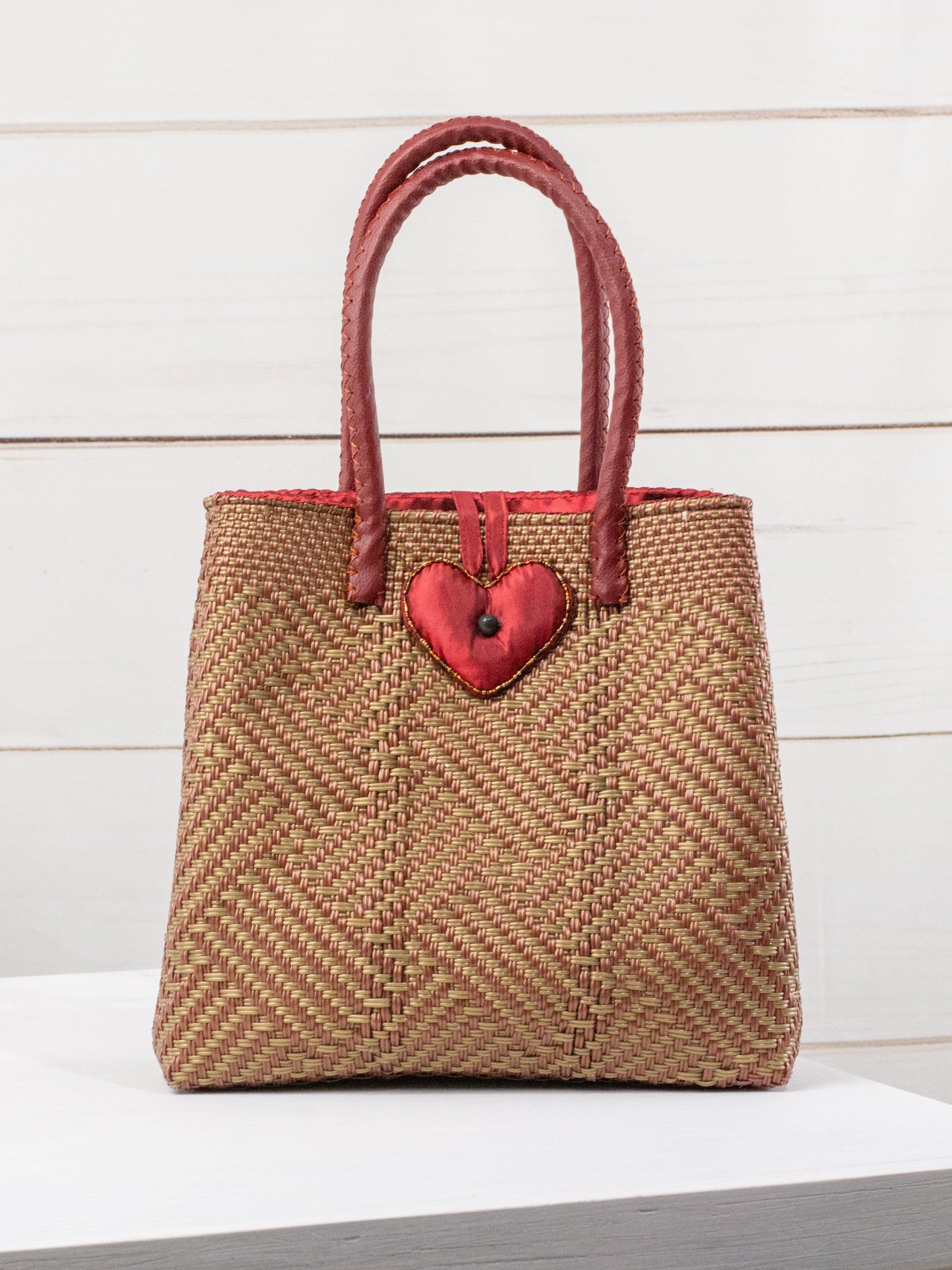 Medium heart milagro artisan bag with flower pompom