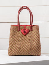 Medium heart milagro artisan bag with flower pompom