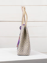 Medium heart milagro artisan bag with flower pompom