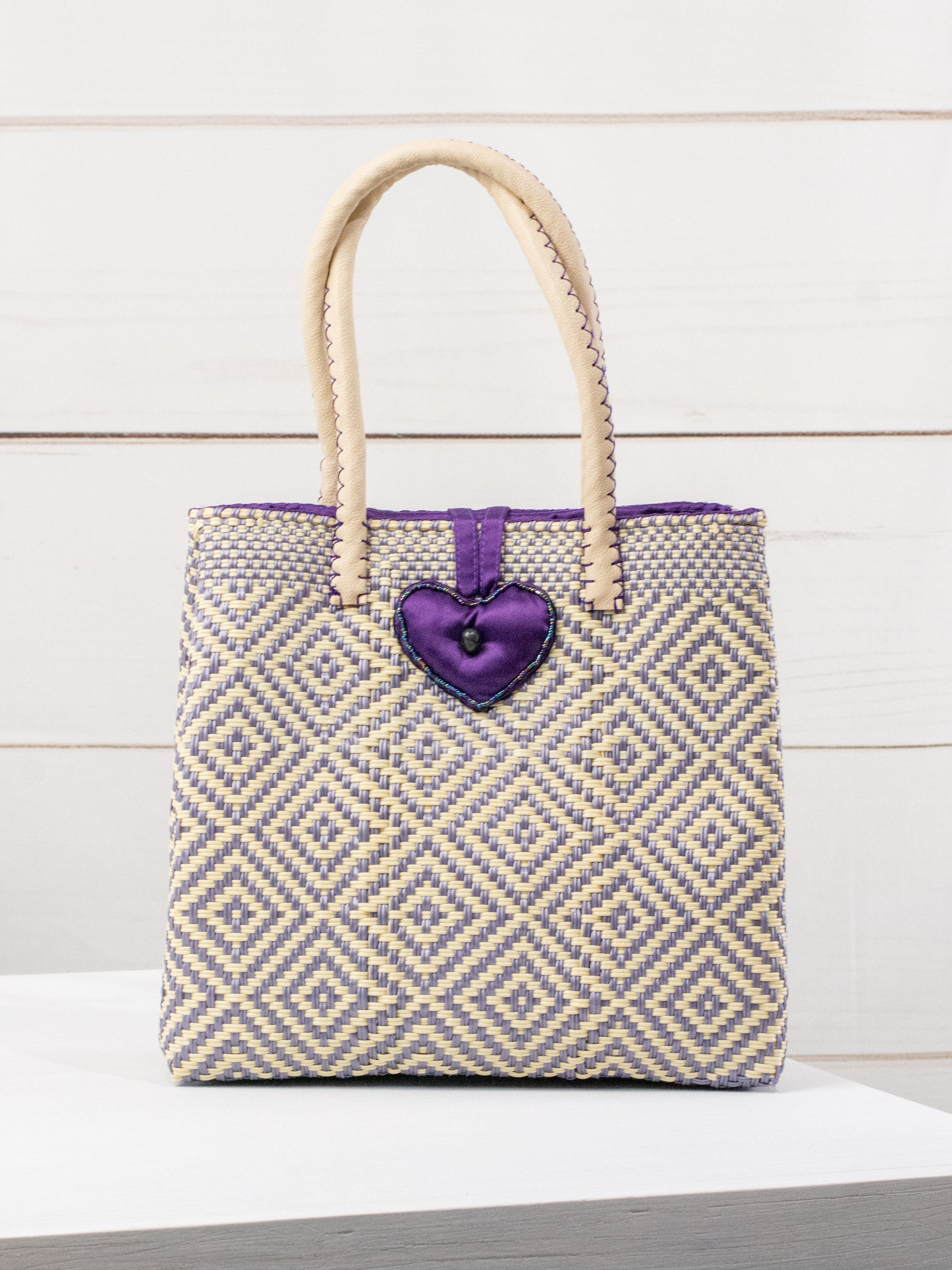 Medium heart milagro artisan bag with flower pompom