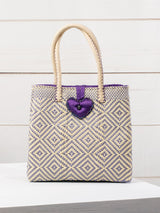 Medium heart milagro artisan bag with flower pompom