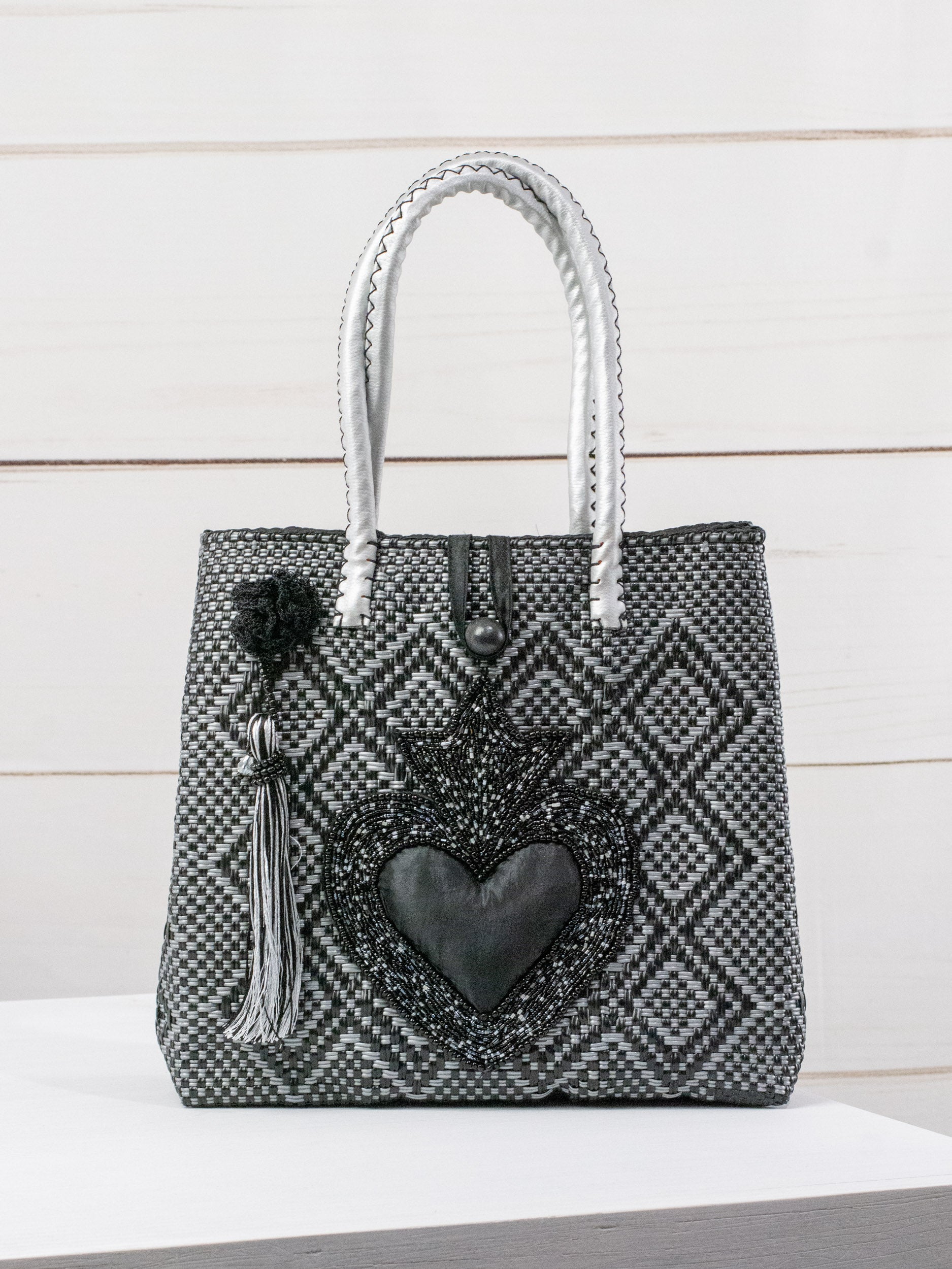 Medium heart milagro artisan bag with flower pompom