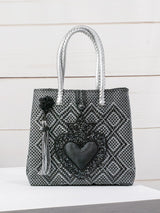 Medium heart milagro artisan bag with flower pompom