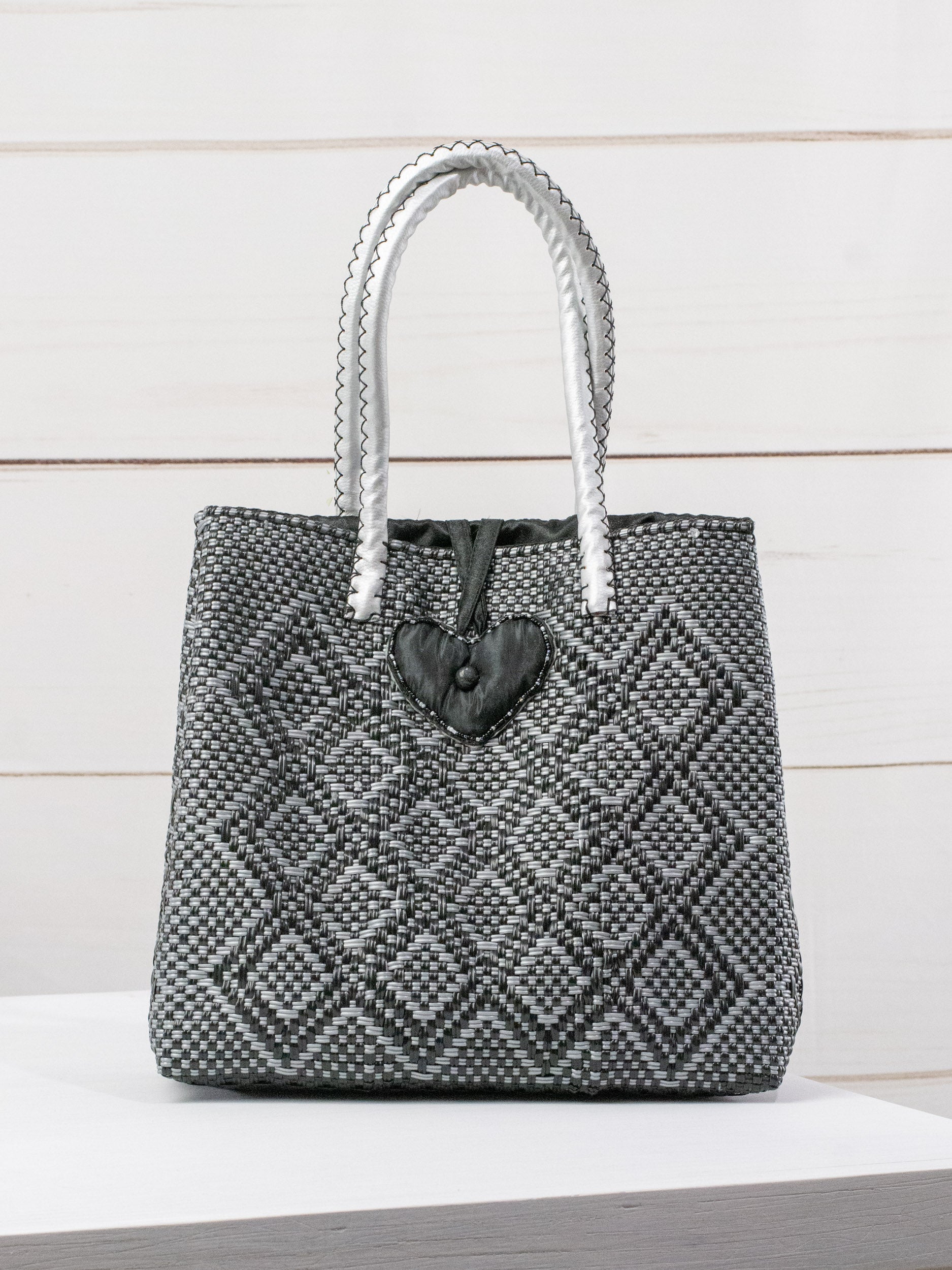 Medium heart milagro artisan bag with flower pompom