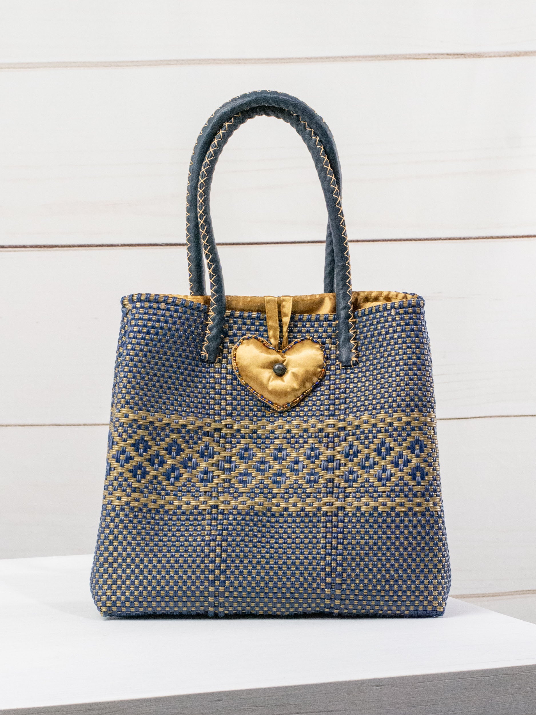 Medium heart milagro artisan bag with flower pompom