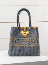 Medium heart milagro artisan bag with flower pompom