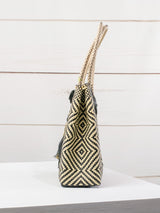 Medium heart milagro artisan bag with flower pompom