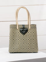 Medium heart milagro artisan bag with flower pompom