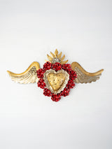 Double flamed winged heart with flowers and candelabra
