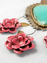 Heart with leaves and three hanging flowers