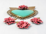 Heart with leaves and three hanging flowers
