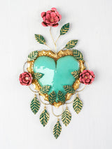 Heart with three flowers and frame of hanging leaves