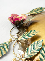 Heart with three flowers and frame of hanging leaves