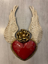 Winged heart with a flower